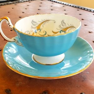 Aynsley turquoise and gold teacup and saucer